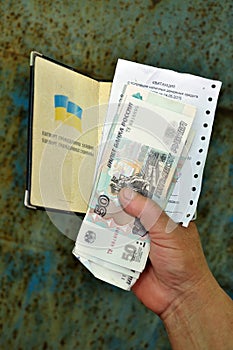 Passport of Ukrainian pensioner and received Russian rubles.