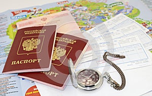 Passports, tickets a pocket watch and map