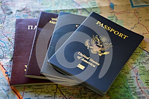 Passports of various countries on a map