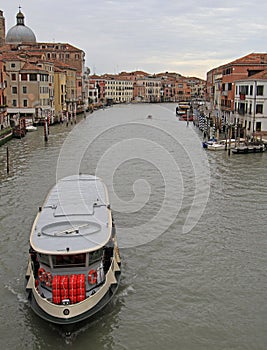 Passsenger ferry floating by grand canal in Venice