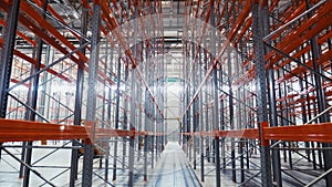 Passway between high modern metal racks in new warehouse