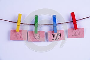 Past, present and future concept. Hanging tags of years 2017, 2