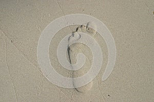 Past symbol- foot step on a sand