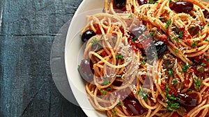 Pasta Alla Puttanesca with garlic, olives, capers, tomato and anchois fish