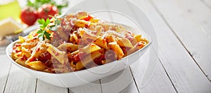 Pasta arrabiata with parsley in bowl