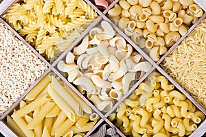 Pasta assortment of different colors background