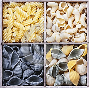 Pasta assortment of different colors background