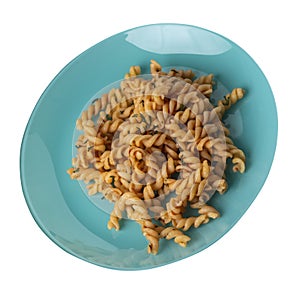 Pasta on a blue plate isolated on white background. pasta in tomato sauce with dill