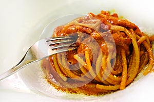 Pasta Bolognese, hot tomato dish photo