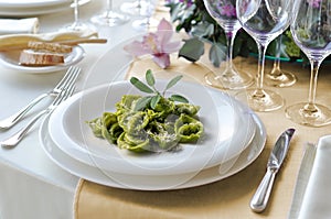 Pasta Bowl of green ravioli with sage and parmesan