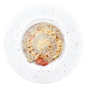 Pasta carbonara isolated. Tagliatelli with becon photo