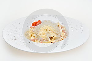 Pasta carbonara. Tagliatelli with becon, cheese and sauce