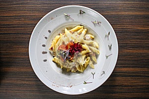 Pasta carbonara in white plate