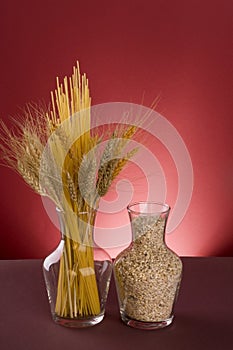 Pasta, cereals and grains in bottles.