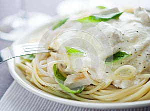 Pasta with chicken and creamy sauce