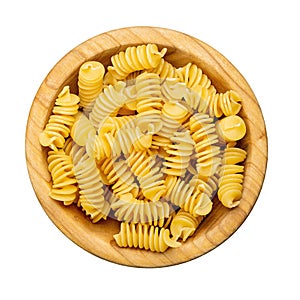 Pasta close-up. Fusilli spirale in a bowl, isolated on white background. Full depth of field. File contains clipping path photo