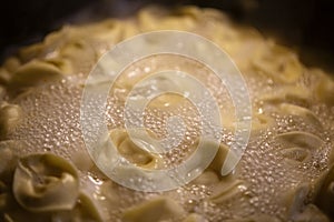 Pasta cooking in boiling water