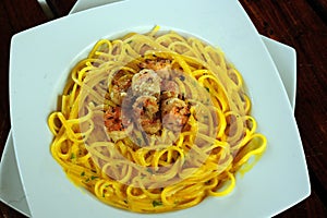 pasta dish -spaghetti- with huancaina aji sauce and sea food