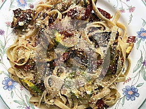 Pasta With Eggplant, Zucchin, Sun Dried Tomatoes and Parmesan Cheese