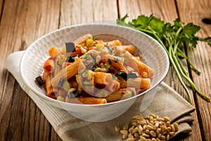 Pasta with eggplants pine nuts and parsley