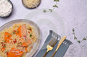 Pasta with fried pumpkin slices