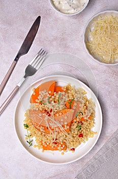 Pasta with fried pumpkin slices