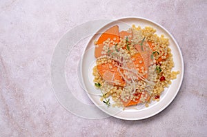 Pasta with fried pumpkin slices