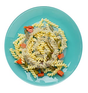 Pasta with green beans with garlicand carrots on a plate isolated on a white background. Mediterranean Kitchen . pasta  top view