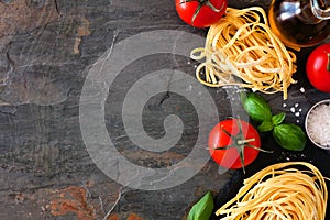 Pasta ingredients, above view side border against a slate background