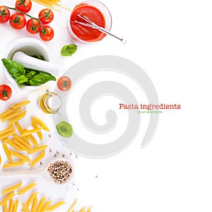 Pasta ingredients - tomatoes, olive oil, garlic, italian herbs, fresh basil and spaghetti on a white board background