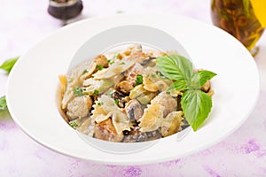 Pasta with meatballs and mushrooms in creamy sauce