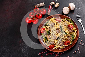 Pasta with mushrooms, cheese, spinach, rukkola and cherry tomatoes