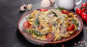 Pasta with mushrooms, cheese, spinach, rukkola and cherry tomatoes