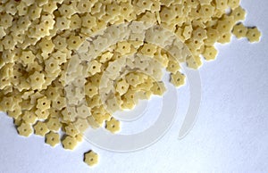 Pasta noodles stars on white background closeup close up isolated