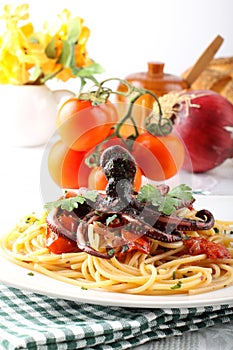Pasta with octopus and tomato