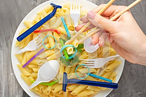 Pasta, pasta with garbage, environmental pollution, garbage, dirt, plastic, bottles. Concepts rescue of soiling from garbage in