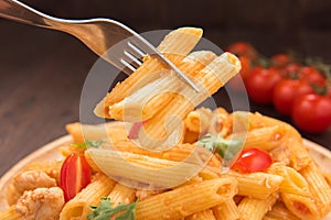 Pasta penne with tomato sauce, Italian food.