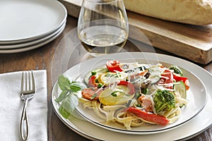 Pasta primavera with fettuccine and garden vegetables