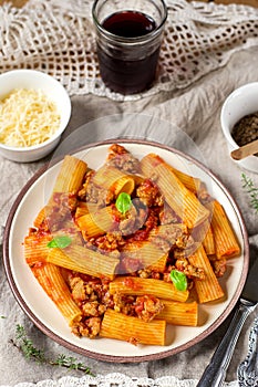 Pasta rigatoni in bolognese sauce with ground meat