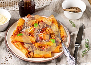 Pasta rigatoni in bolognese sauce with ground meat