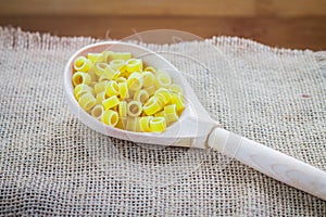 Pasta rings on background