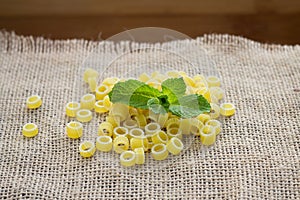 Pasta rings on background