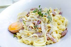 Pasta with roast ham on the table