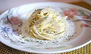 Pasta. Rolled spaghetti in a dish.