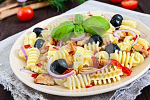 Pasta salad radiatori with chicken, black olives, blue onion, sweet pepper