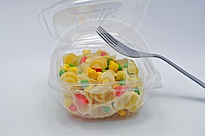 Pasta salad takeaway with fork