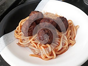 Pasta with sauce and homemade meatballs