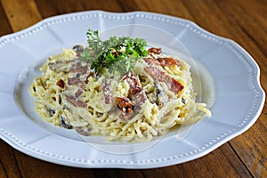 Pasta with sausage cheese and greens