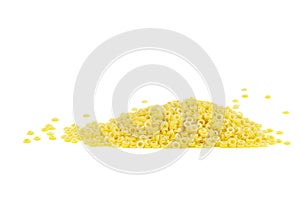Pasta shaped like rings on white background