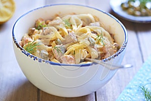 Pasta with smoked salmon and capers in cream sauce